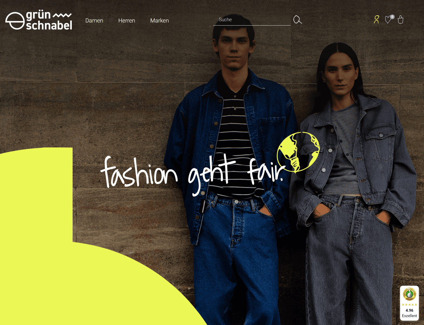 Screenshot der Grünschnabel-Startseite mit zwei Models in Jeansmode vor Steinwand und dem Slogan „fashion geht fair“ im Vordergrund.