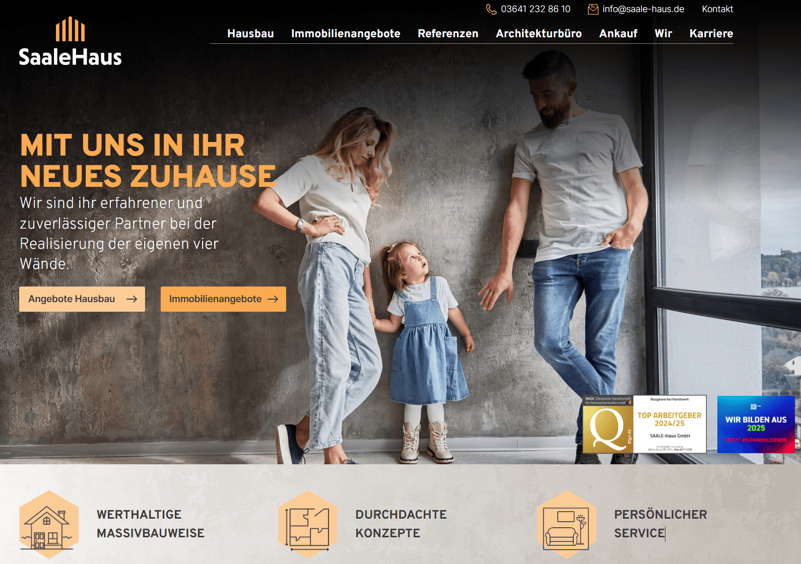 Startseite von SAALE-Hause mit Familie und Slogan „Mit uns in Ihr neues Zuhause“.